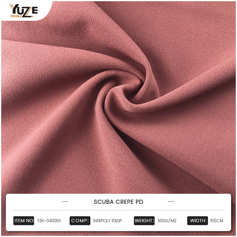 Vilka är applikationsfördelarna med Moss Crepe -tyg inom området Haute Couture, och hur kan det ge unik erfarenhet till designers och konsumenter?