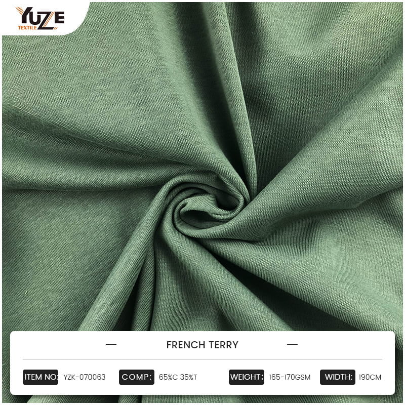 Vilka mekaniska och strukturella element definierar den unika komforten och prestandan hos French Terry Tyg?